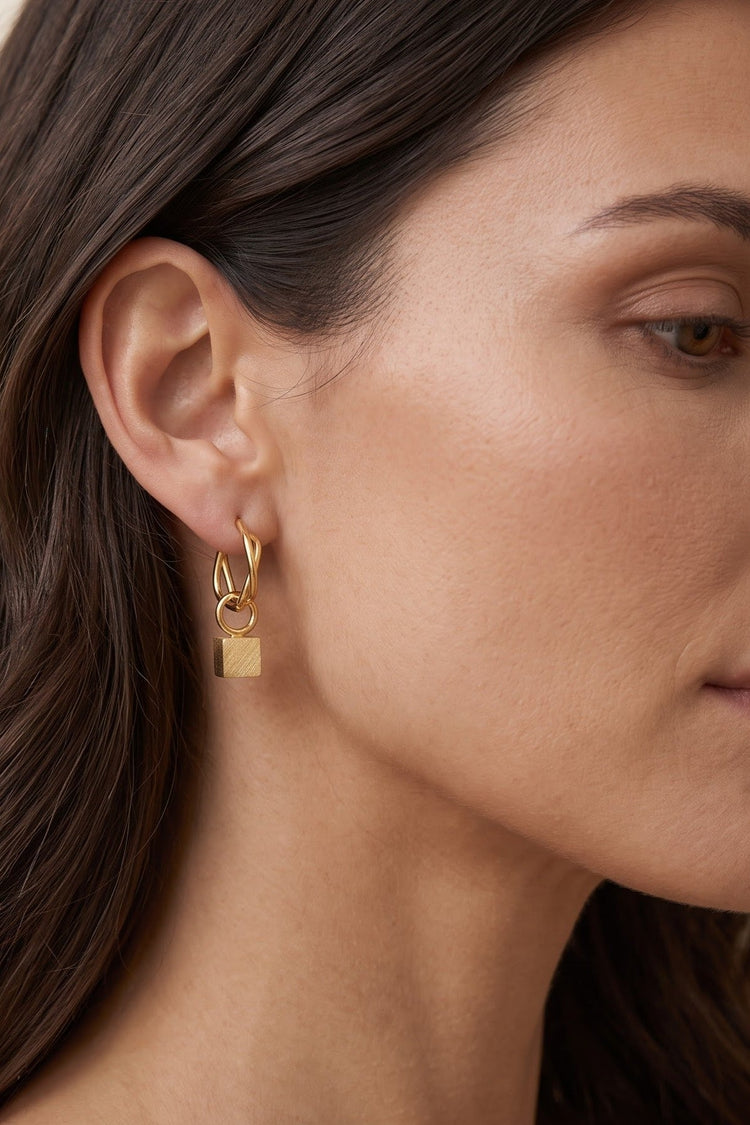 Huggie earrings placeholder — to be replaced