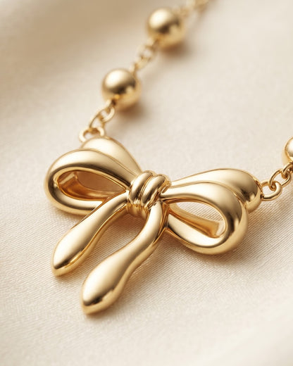 Solenne Bow Pendant Necklace – Cinematic shot