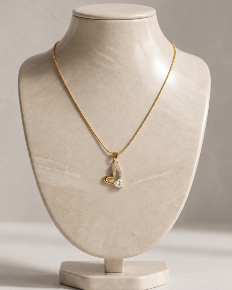 Solreen Halo Heart Pendant Necklace displayed on a jewelry stand showing chain length and pendant