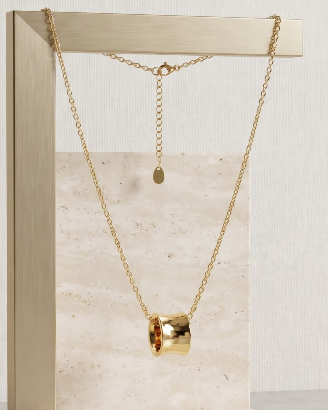 Solyria Drum Pendant Necklace – On display stand