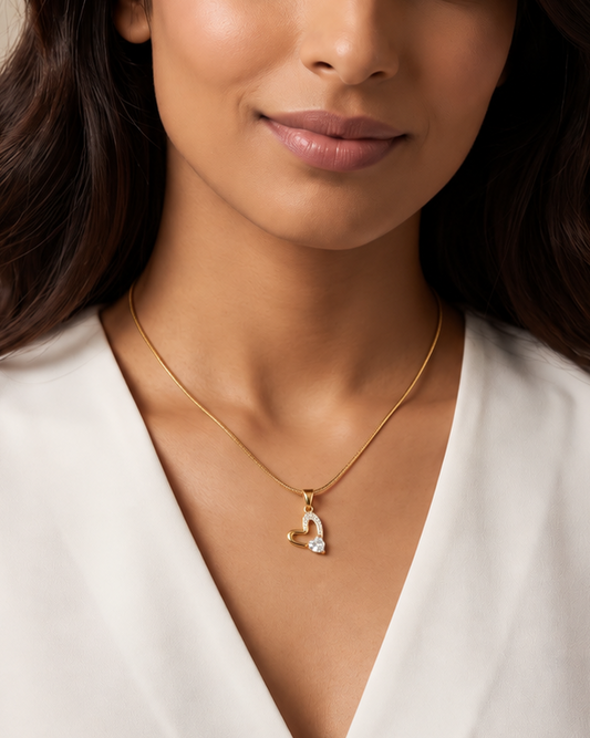 Woman wearing the Solreen Halo Heart Pendant Necklace at the collarbone