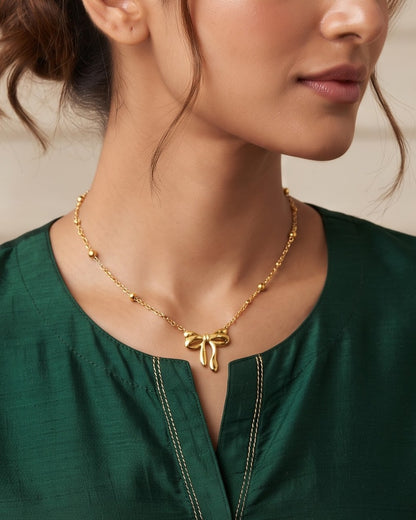 Solenne Bow Pendant Necklace – Worn shot