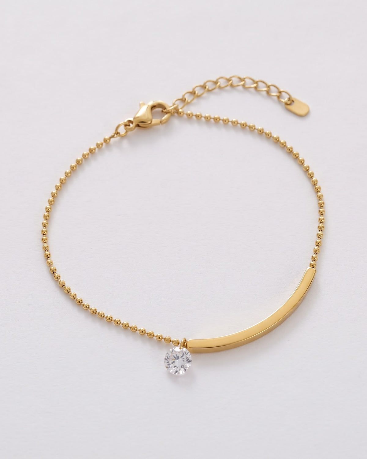 Solenari Bar Chain Anklet - gold-tone ball chain anklet with a curved bar and a clear stone