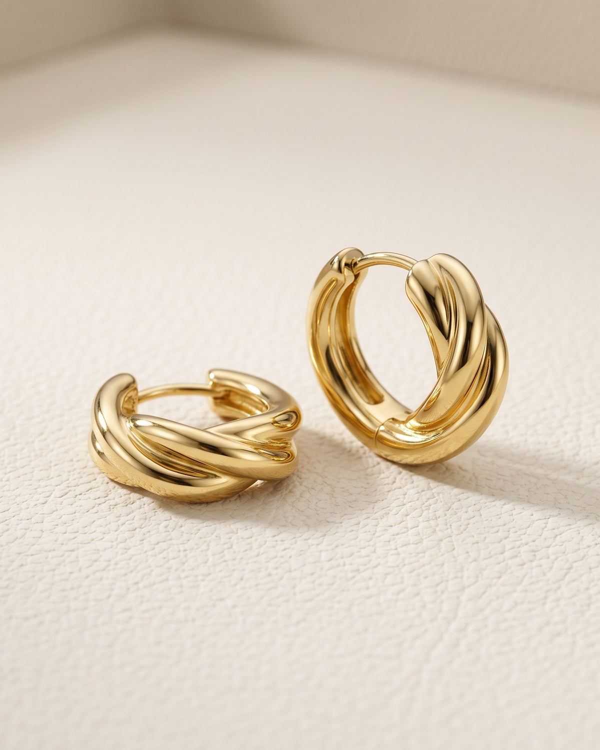 Solvenya Crossover Hoop Earrings - Hero view