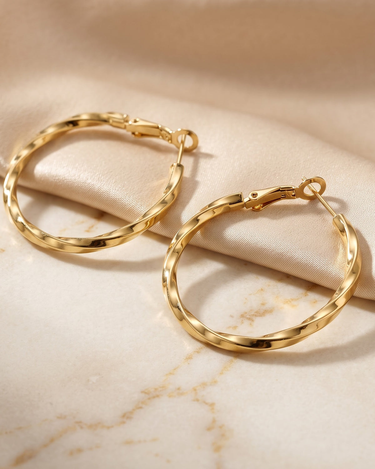 Soltwyn Twist Hoop Earrings - Hero view