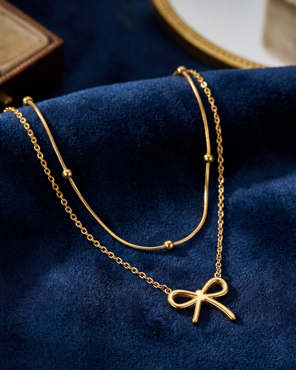 Solbeline Bow Layered Chain Necklace - Close-up view