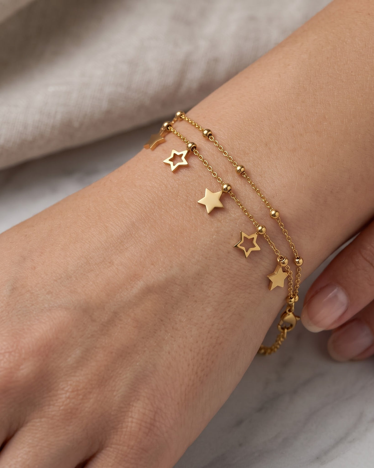Solmyra Star Dangle Chain Bracelet - worn view