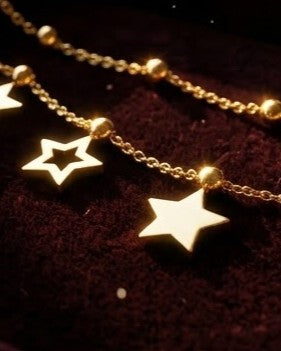 Solmyra Star Dangle Chain Bracelet - cinematic view