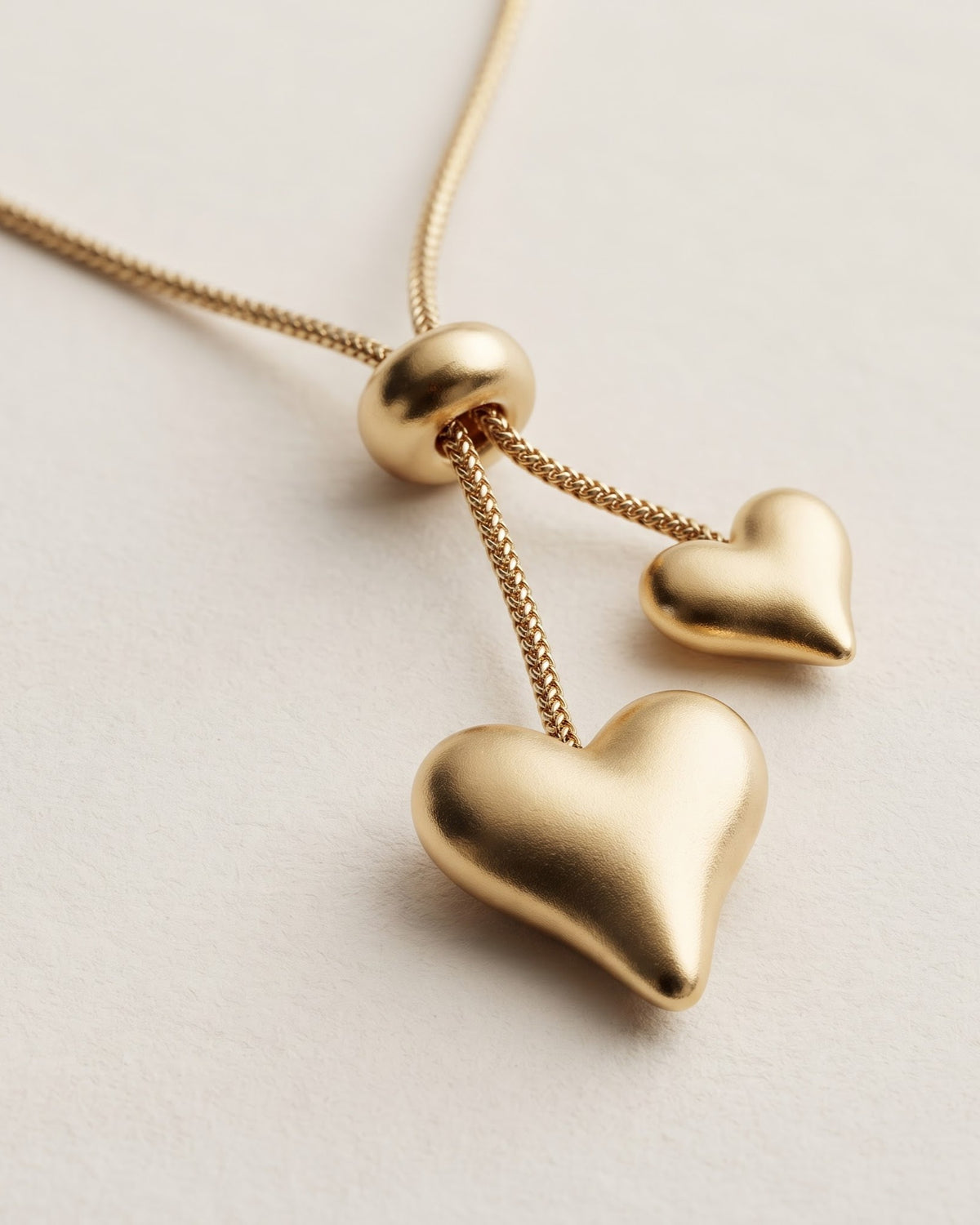 Solnelle Twin Heart Lariat Necklace - worn view on model