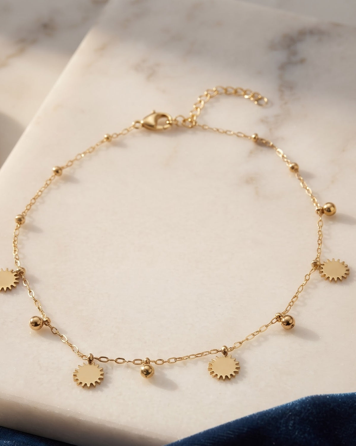 Soltamo Sunburst Charm Anklet - gold-tone charm anklet with sunburst discs and small balls