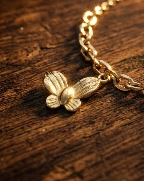 Solfaye Butterfly Charm Anklet - worn view on ankle