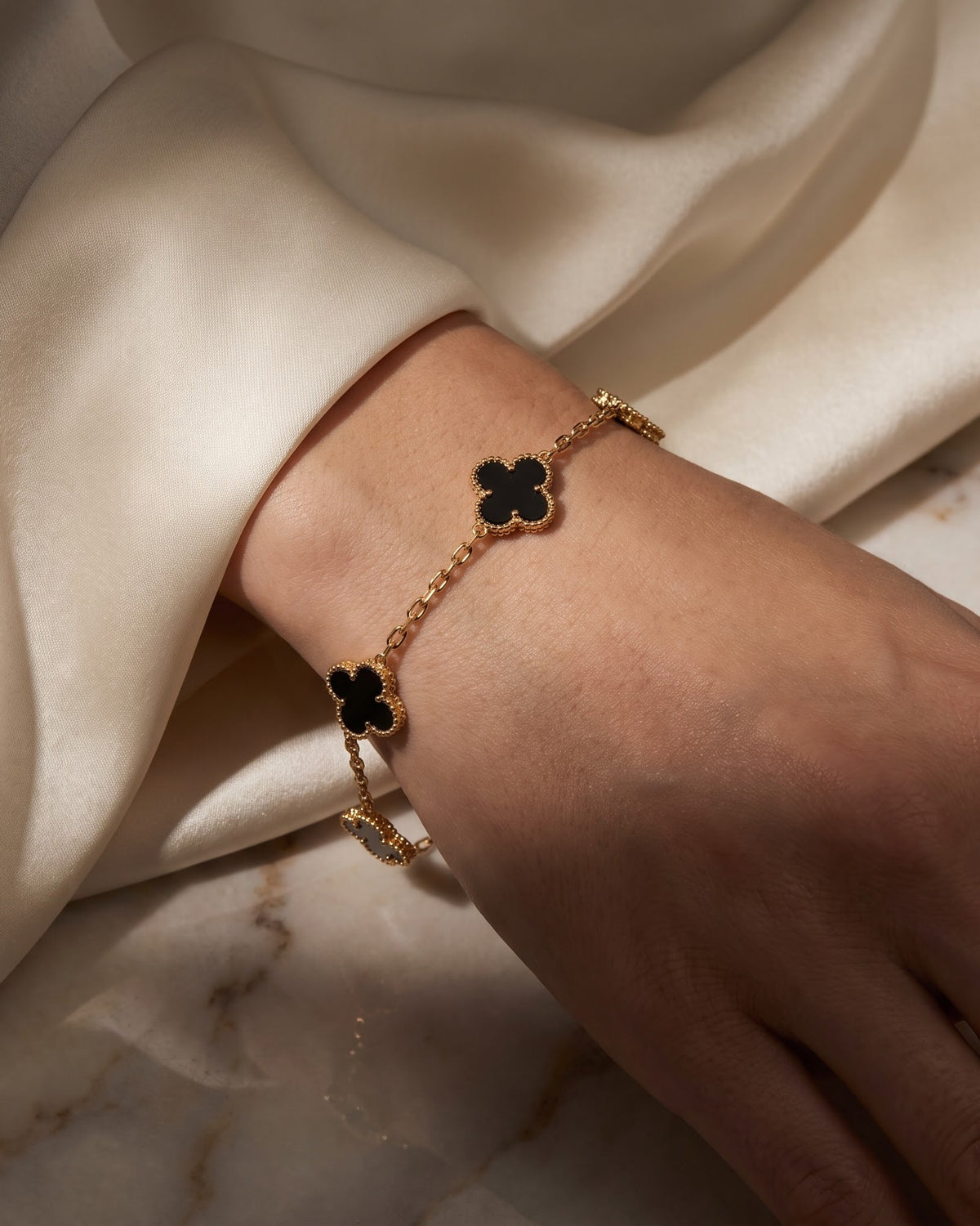 Soltessa Black Flower Chain Bracelet - close-up view