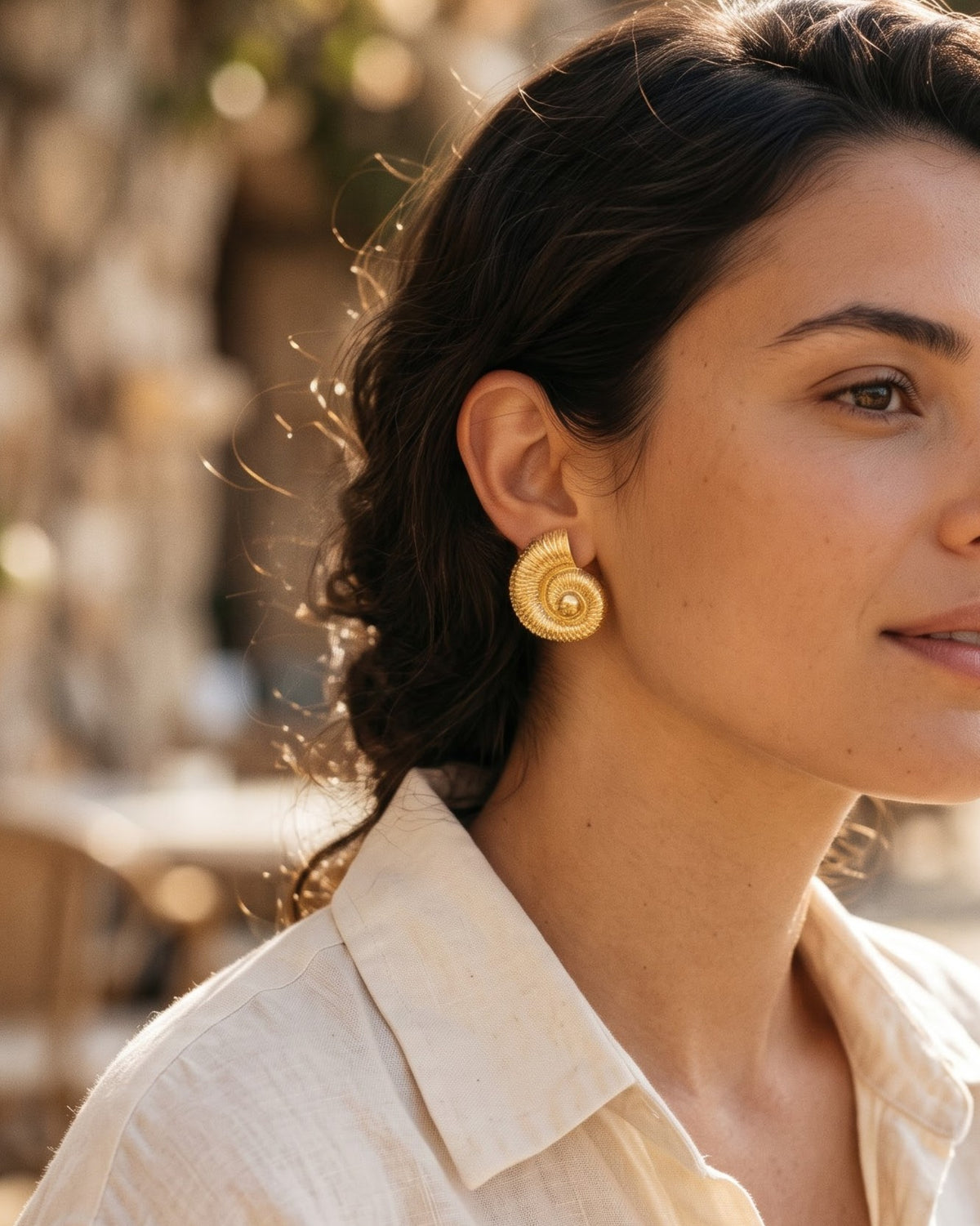 Solmare Spiral Shell Stud Earrings - Model Worn Shot