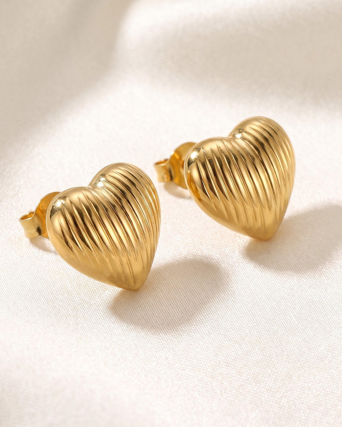 Solrovia Ribbed Heart Stud Earrings - Hero Shot