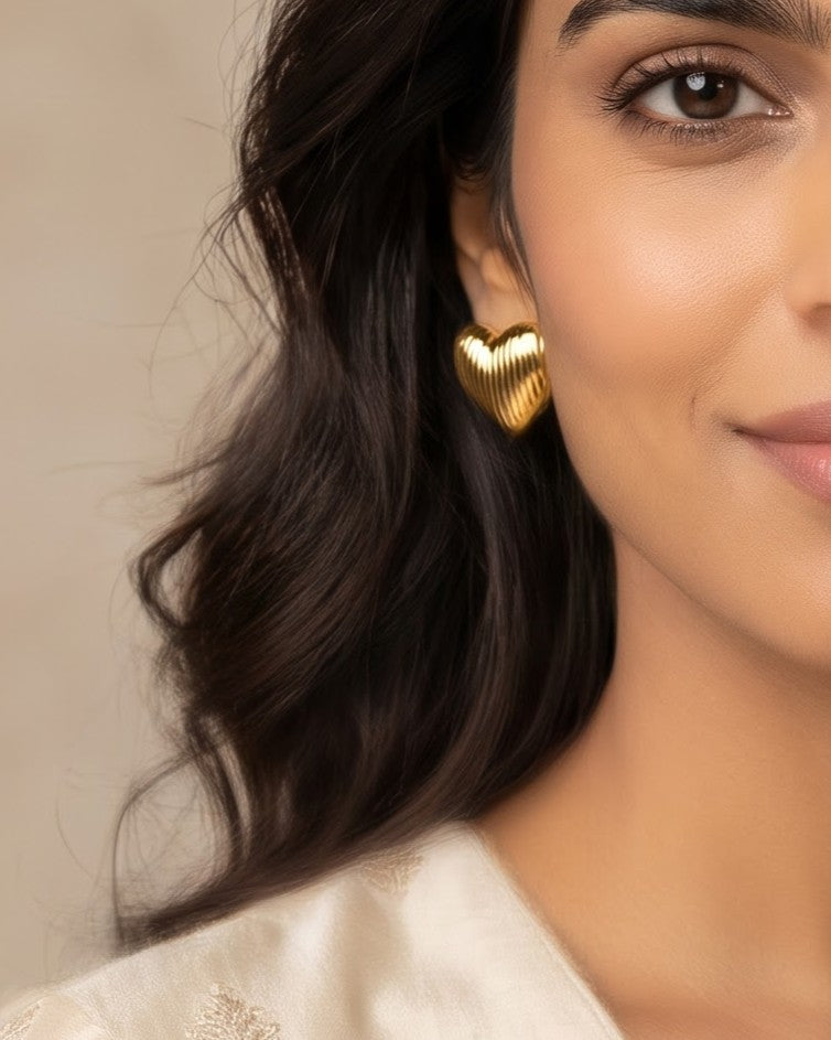 Solrovia Ribbed Heart Stud Earrings - Model Worn Shot