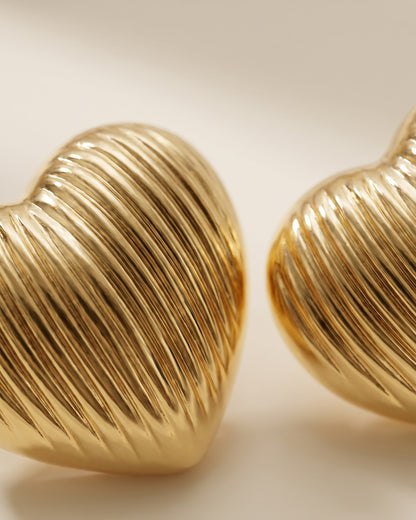 Solrovia Ribbed Heart Stud Earrings - Cinematic Shot