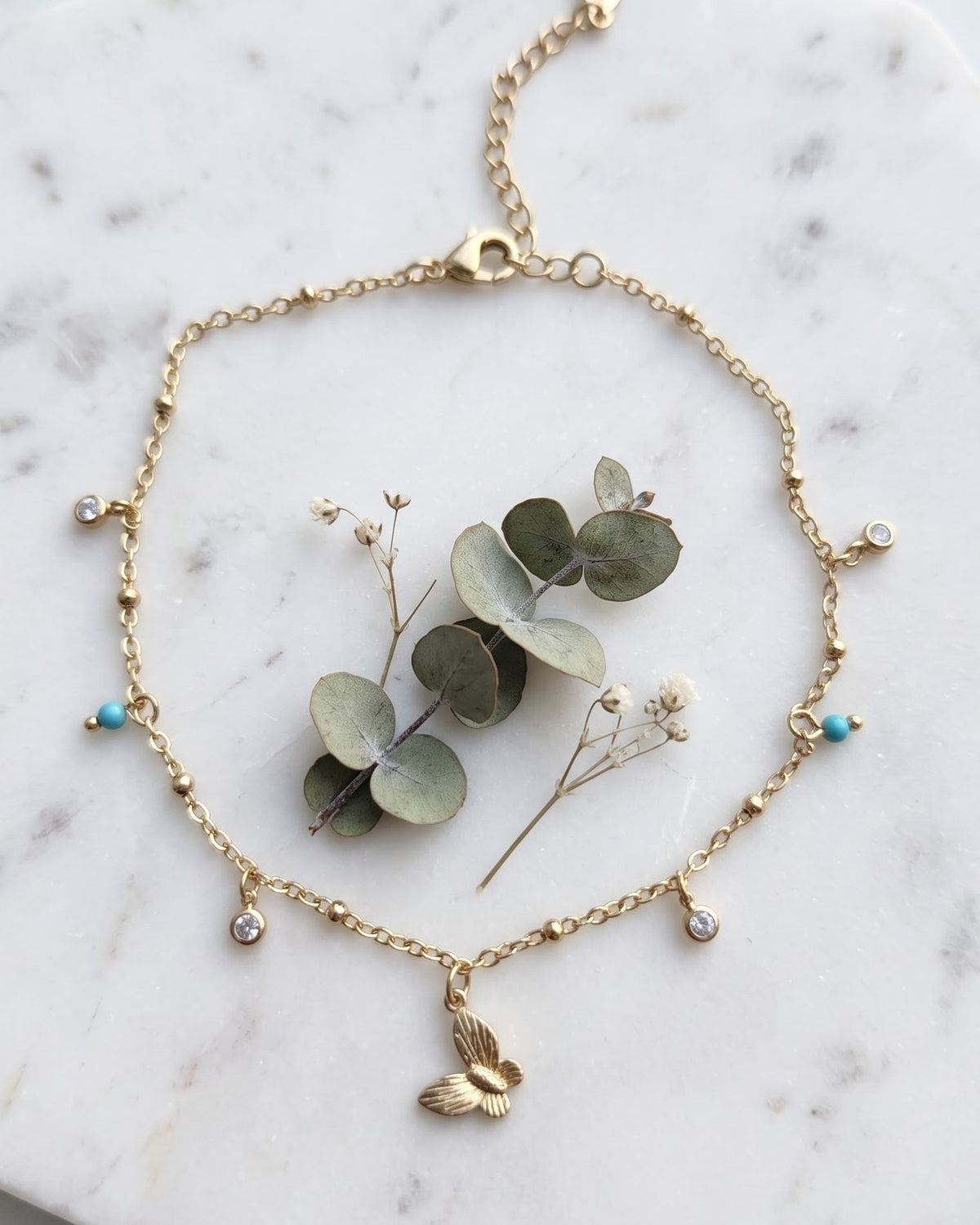 Solnyra Butterfly Charm Anklet - display view