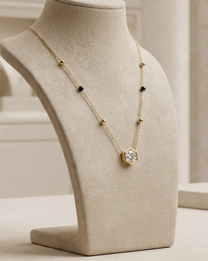 Solvexa Hexagon Mangalsutra displayed on a jewelry stand showing chain length