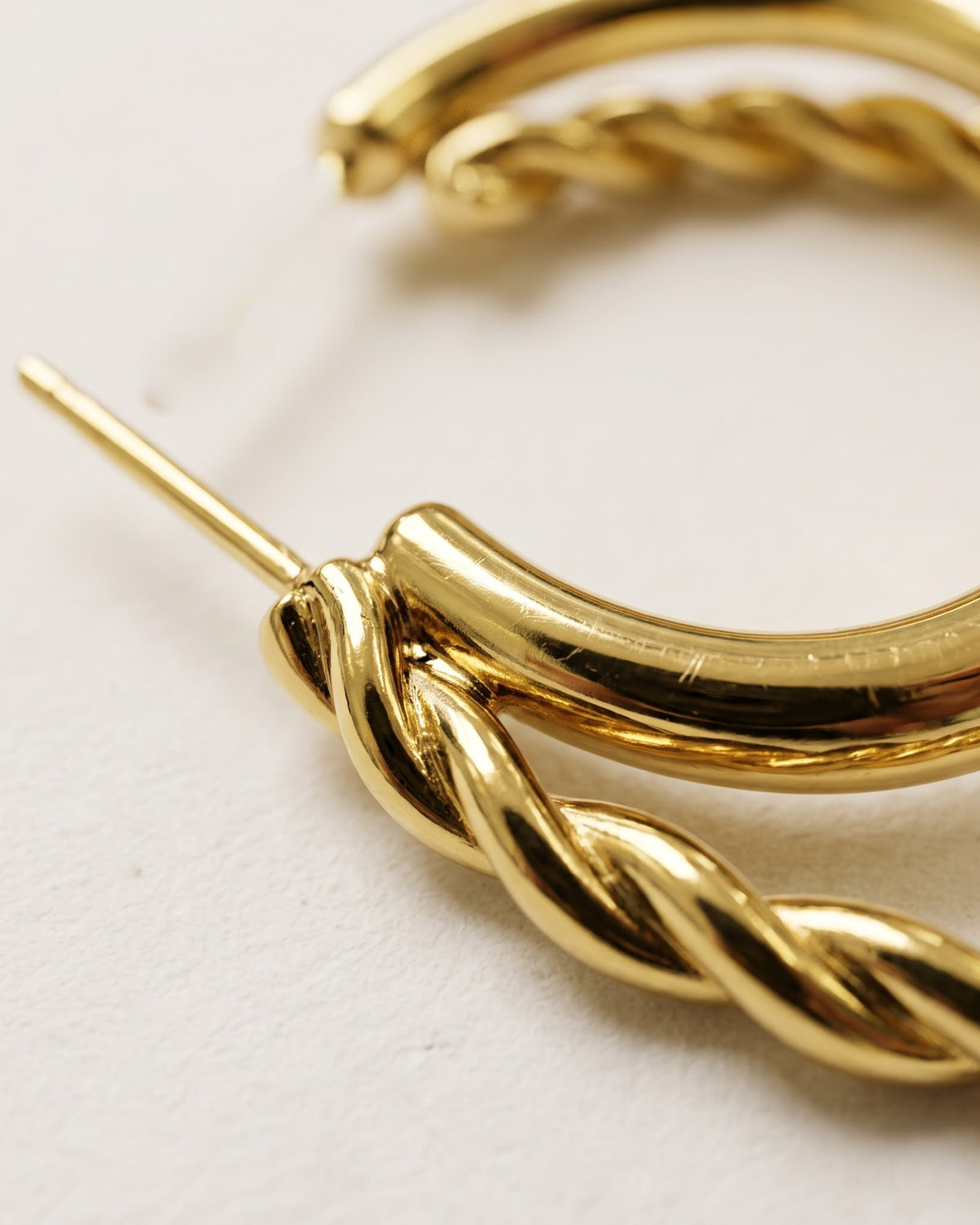 Solnari Twist Stud Earrings - Cinematic Shot