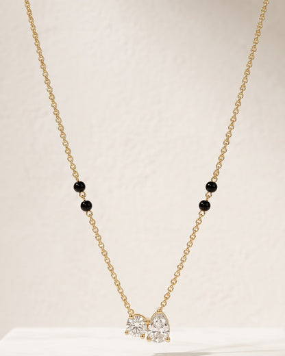 Close-up detail of the Solveya Drop Duo Mangalsutra a pear-cut and round-cut cubic zirconia duo