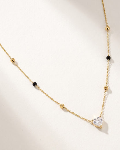 Close-up detail of the Solura Heart Mangalsutra a heart-shaped cubic zirconia pendant