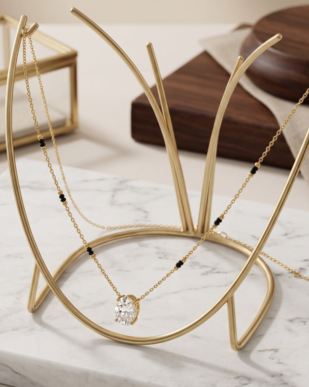 Solyne Oval Solitaire Mangalsutra displayed on a jewelry stand showing chain length