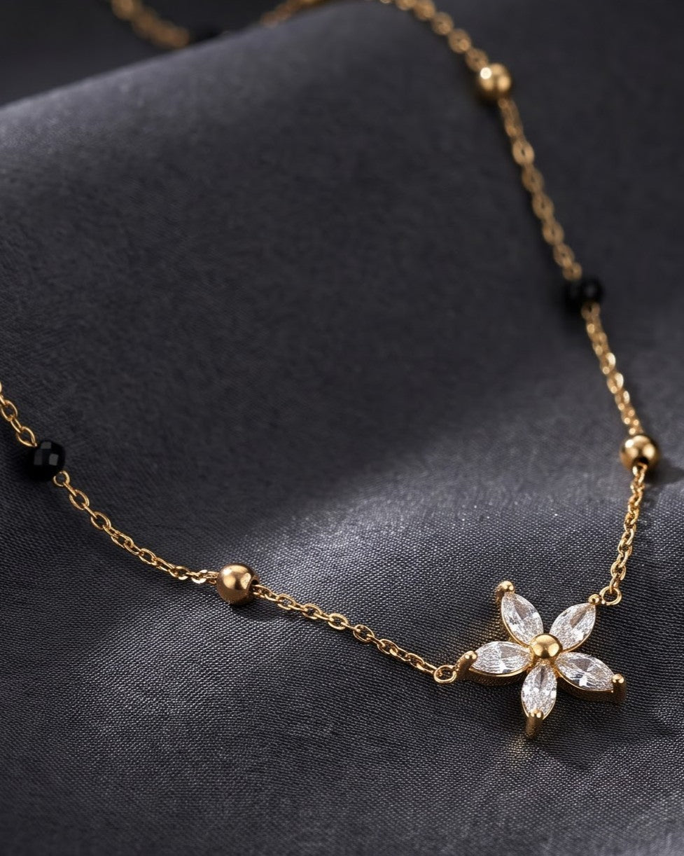 Close-up detail of the Solyssa Blossom Mangalsutra a six-petal marquise cubic zirconia flower