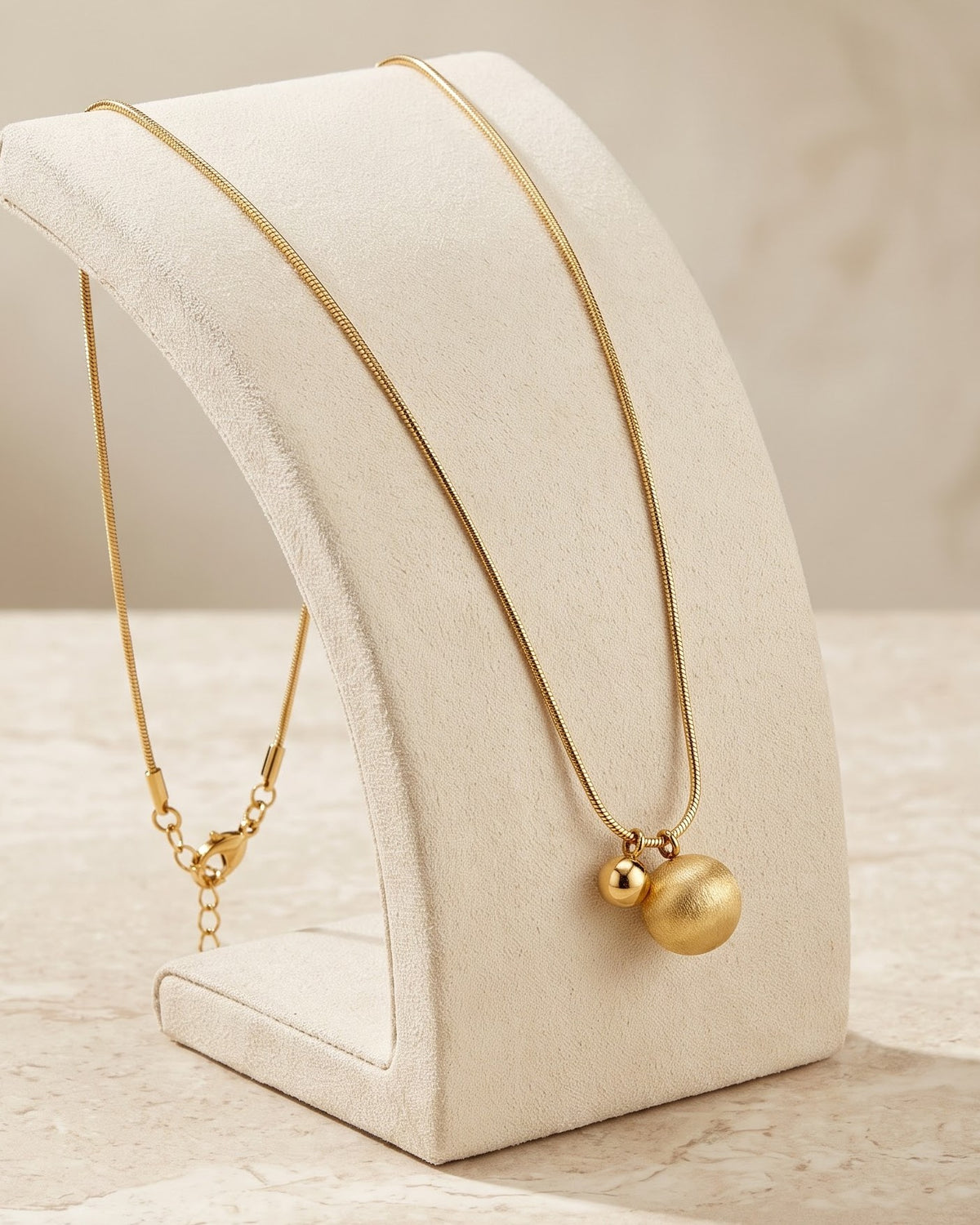 Solmona Duo Orb Pendant Necklace – Stand/Display Shot