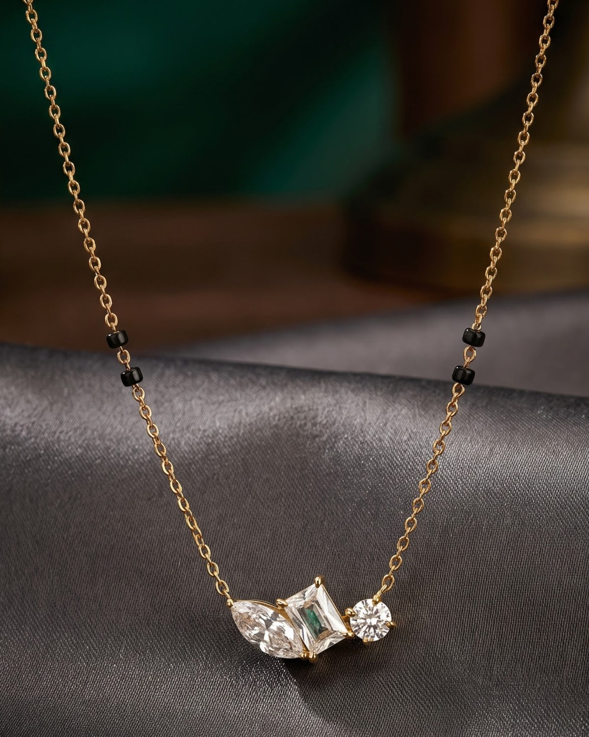 Close-up detail of the Solyra Stone Trio Mangalsutra a marquise, princess-cut and round cubic zirconia trio